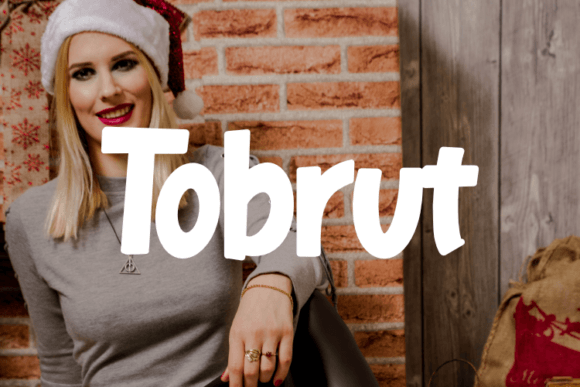 Tobrut Typeface Review: A Versatile Script for Brand Identity